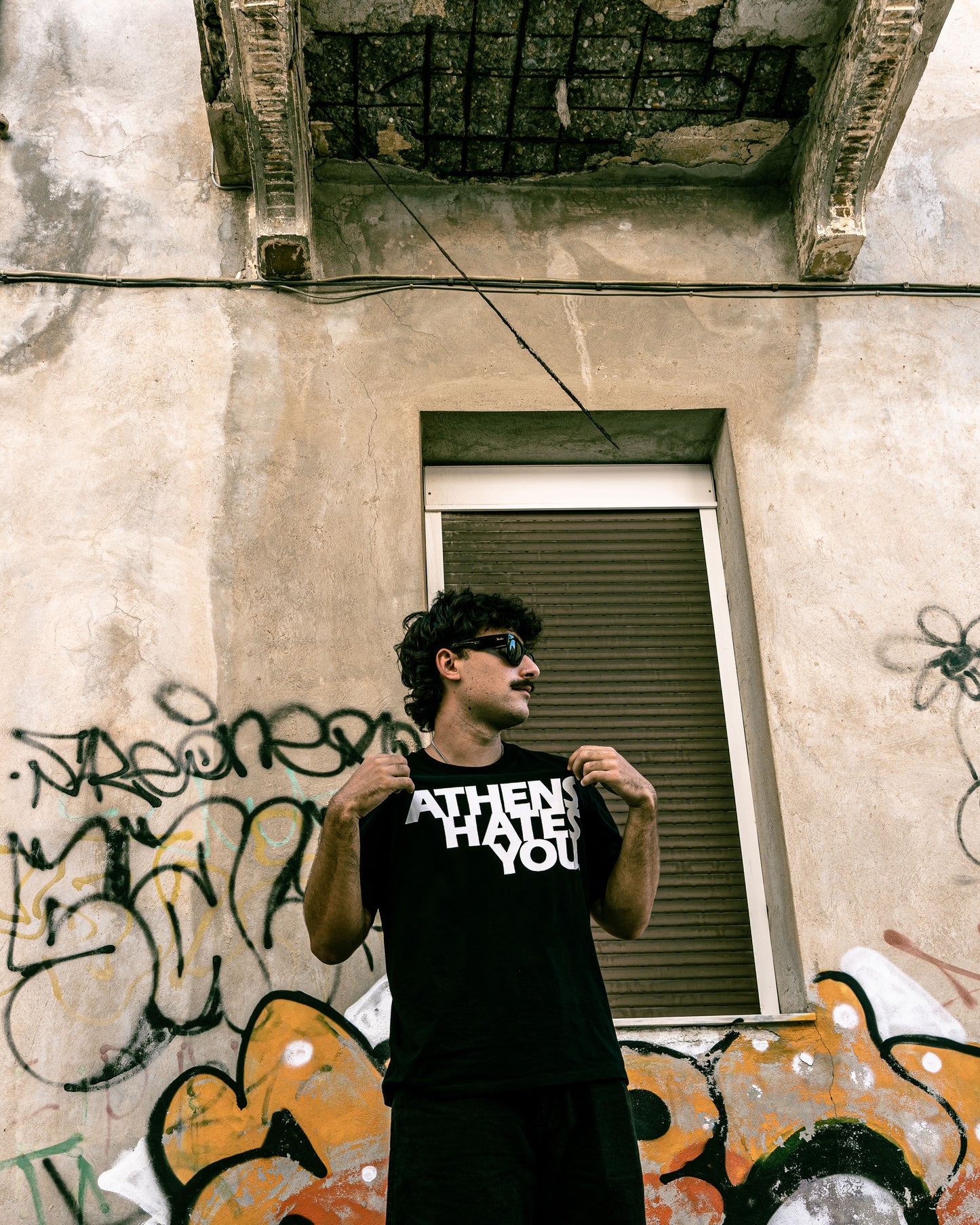 ATHENS HATES YOU. T-SHIRT